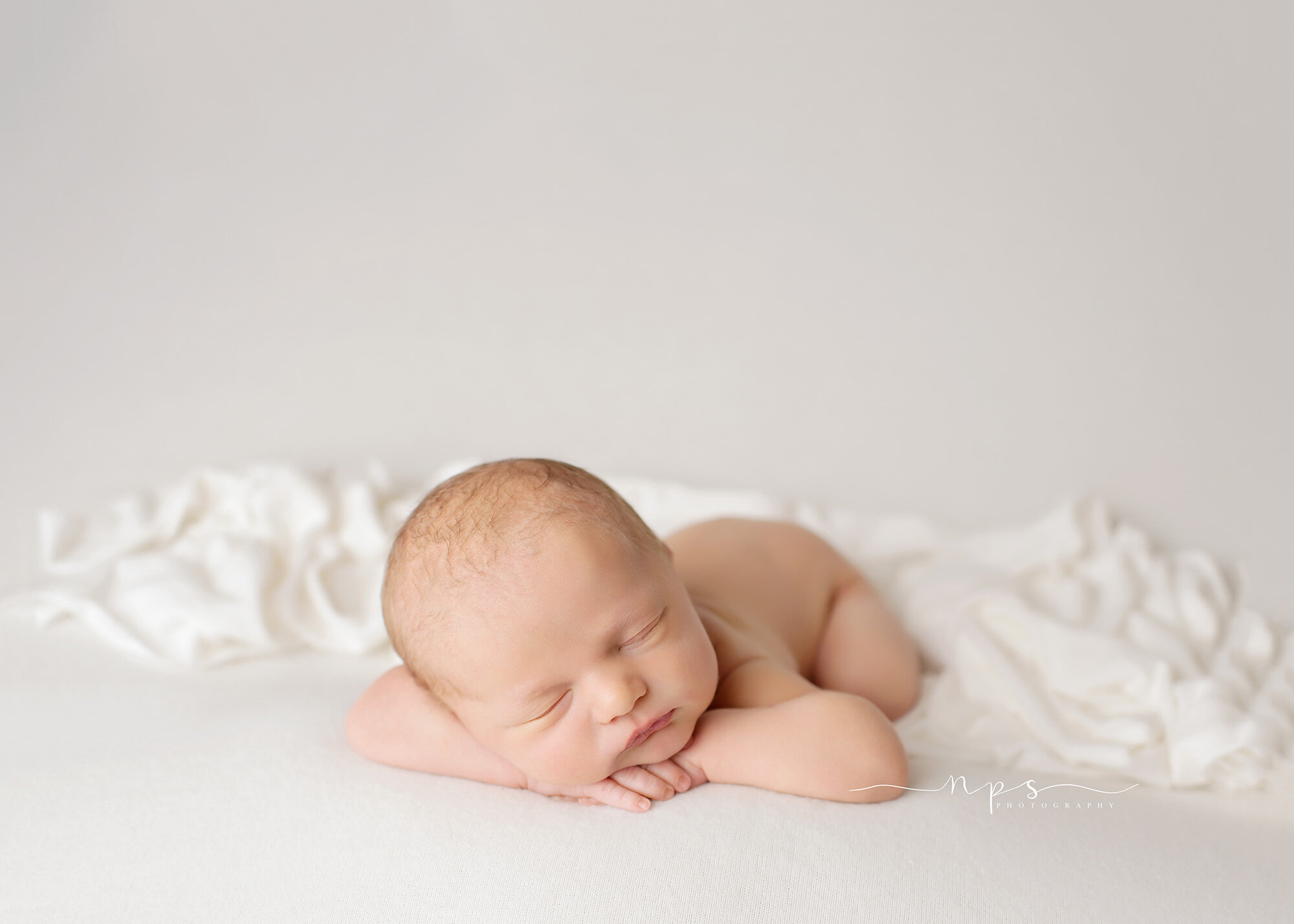 simple newborn pose
