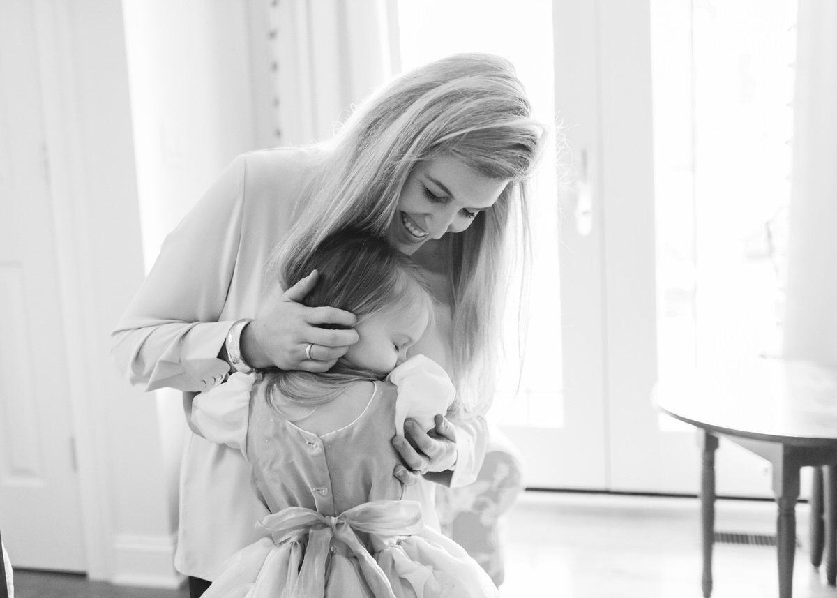 Why Parents Should Be in Family Photos | DC In-Home Photographer - NPS Photography mom hugging daughter