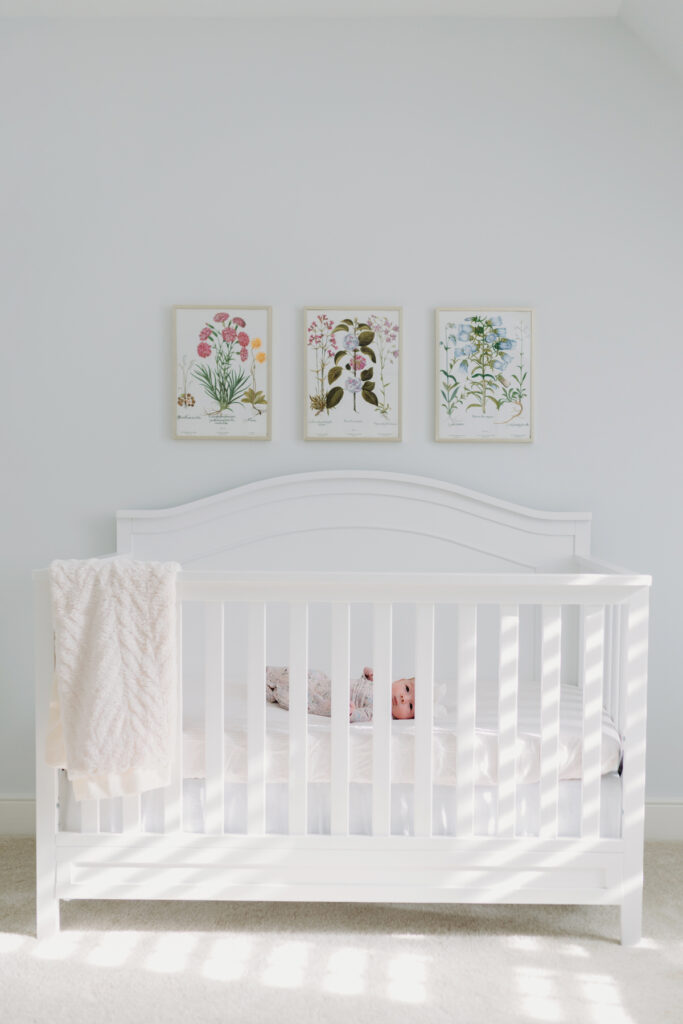 newborn baby in a crib photographed by NPS Photography