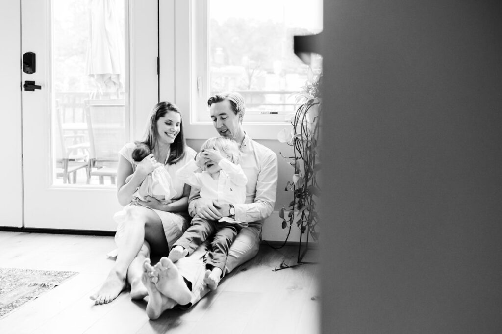 family sitting on floor of their washington dc home photographed by NPS Photography