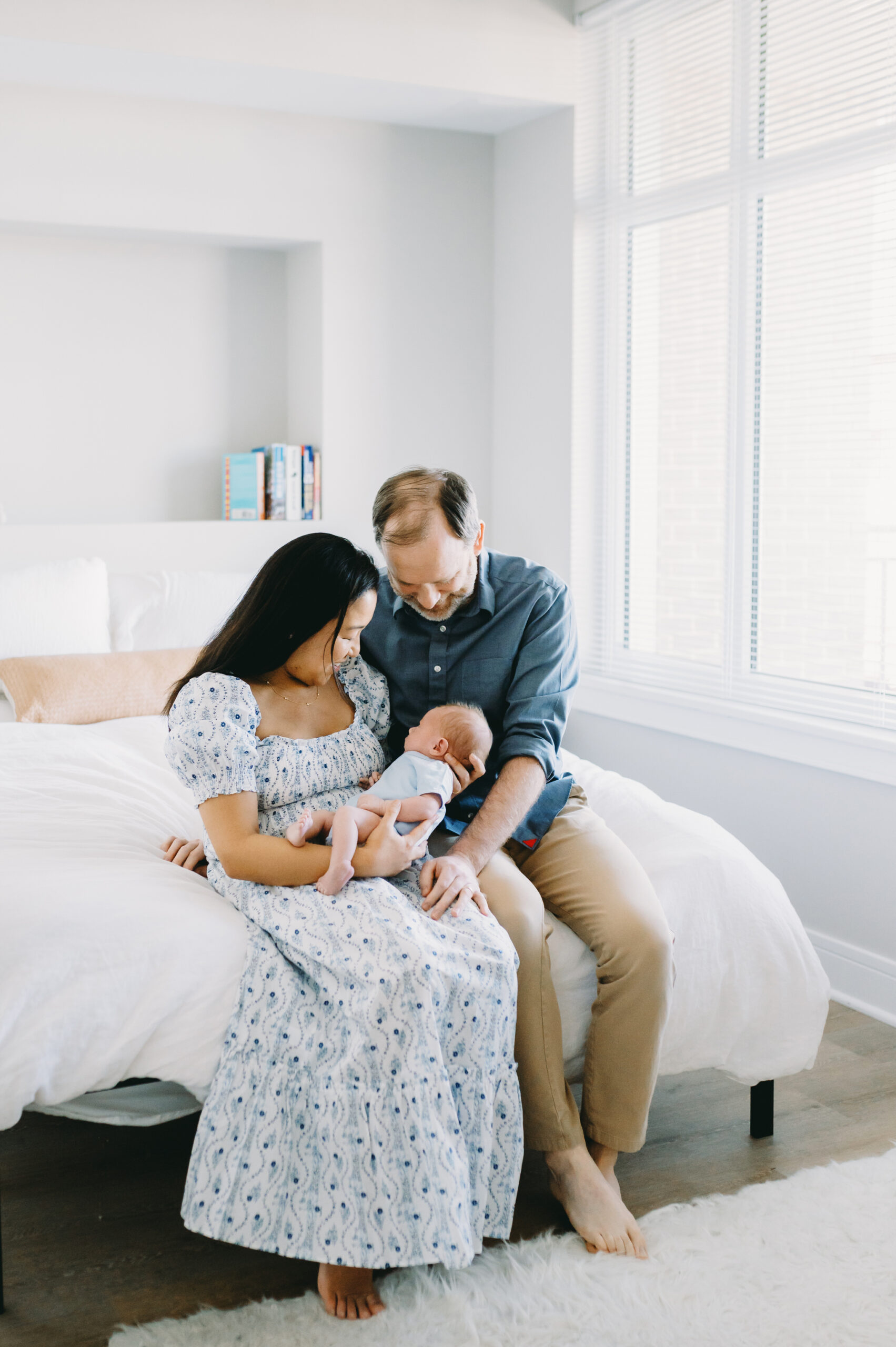 Powerful Session Prep for Photographers: How a 12 Slide PowerPoint Inspired Me - NPS Photography parents holding newborn