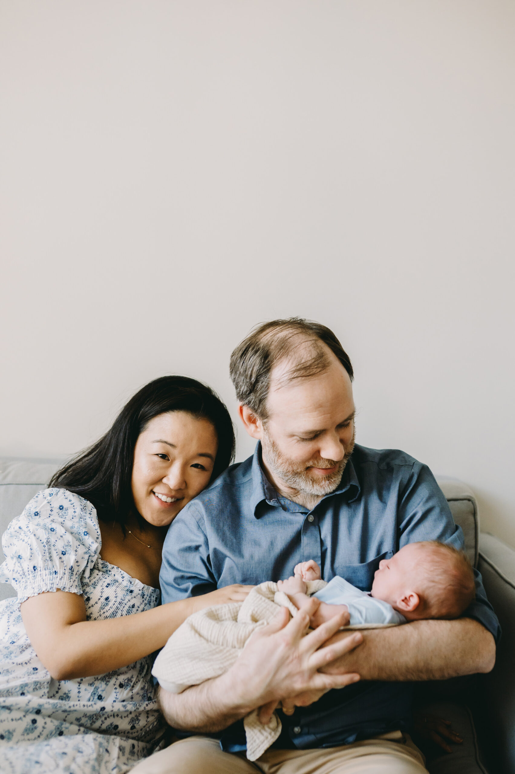Powerful Session Prep for Photographers: How a 12 Slide PowerPoint Inspired Me - NPS Photography parents with newborn baby in swaddle - session prep for photographers