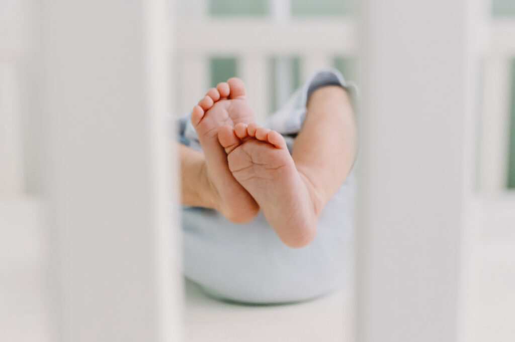 Luxury Family Photographer Pricing: You Are Not Your Client’s Budget Coach - NPS Photography detail photo of newborn baby's feet