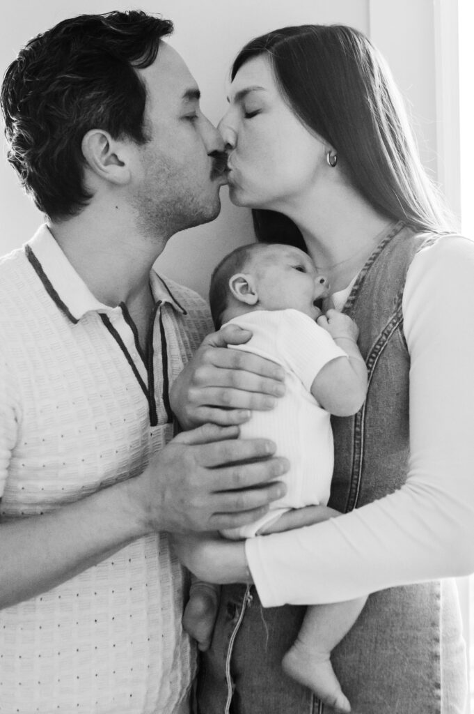 Yes, I'm Still Your Washington DC Family Photographer —Here’s the Scoop - NPS Photography mom and dad holding baby and kissing
