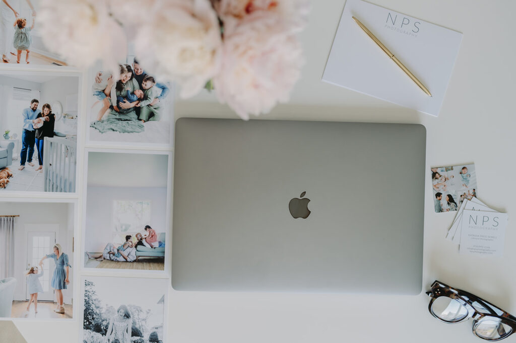 Flat lay of a photographer’s workspace with session prints—ideal visual content for a compelling contact page.