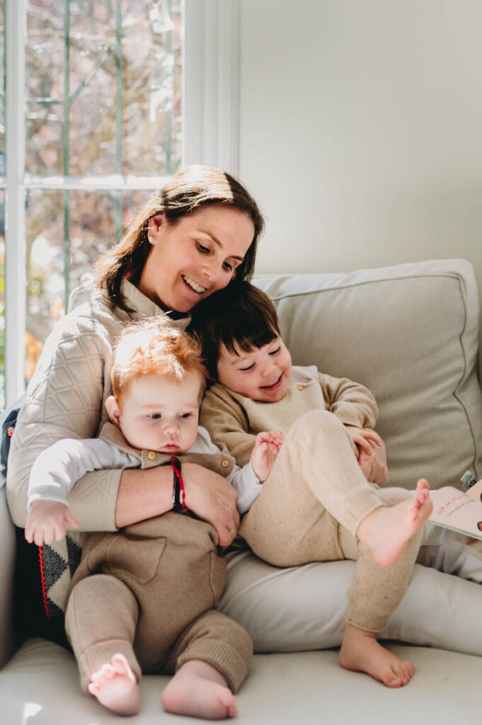 mom hugging two boys