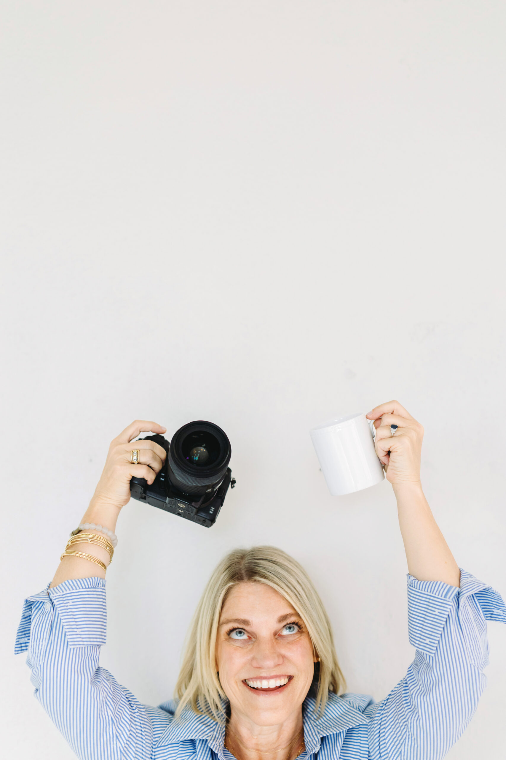Photography Mentorship: How My Teaching Background Shapes the Way I Support Photographers - NPS Photography Photography mentorship leader Natasha celebrating her love of photography and mentoring with a camera and coffee in hand.