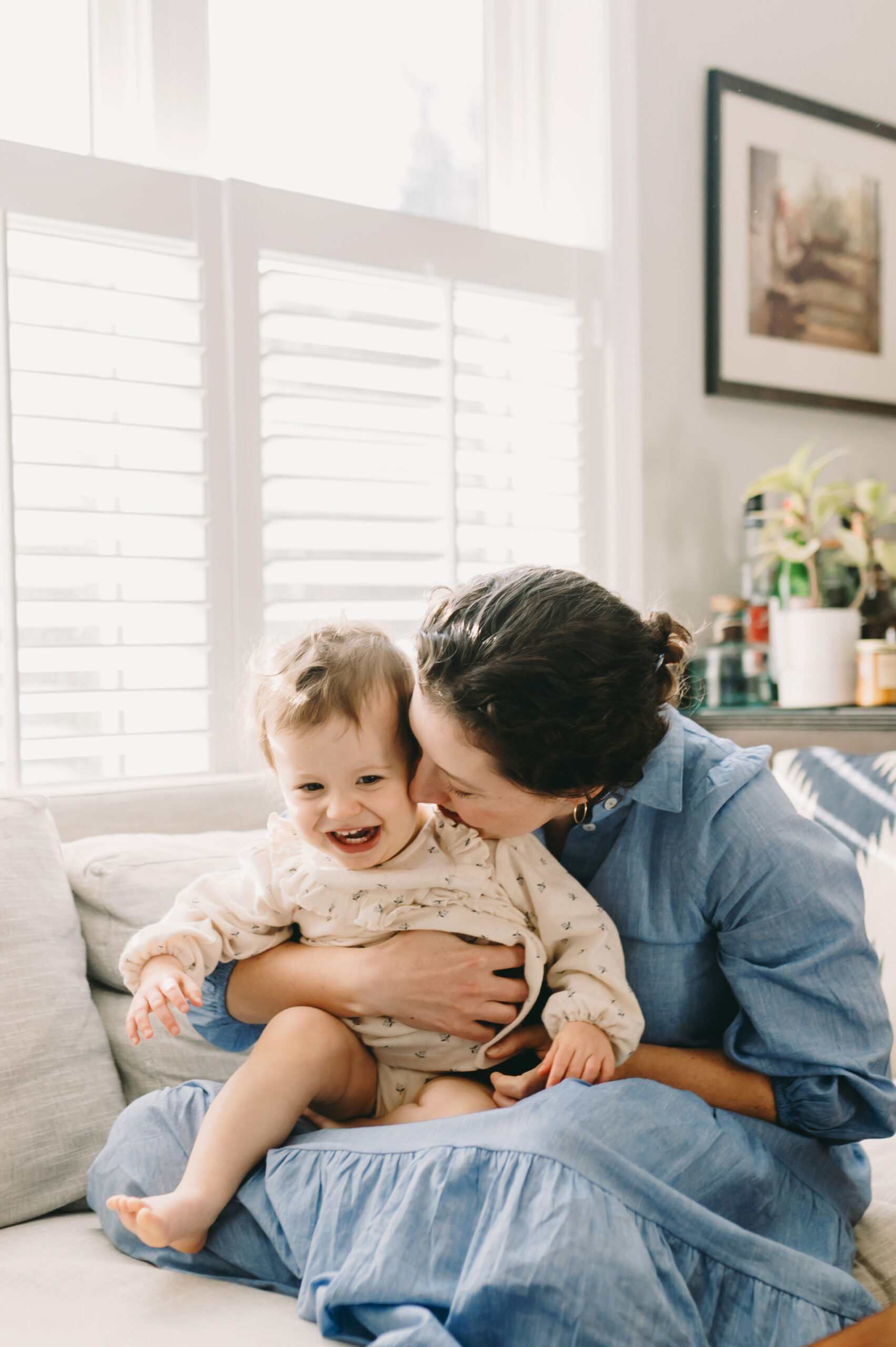 Family Photo Session Tips: Why Parents Belong in the Photos - NPS Photography mom snuggling with daughter in their Glen Echo, MD home